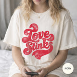 Love Stinks Graphic Tee | Funny Anti Valentine Shirt | Comfort Colors 1717 Unisex T-Shirt