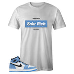 White Crew Neck SNKR RICH Box Logo T-shirt to Match Air Jordan Retro 1 University Blue